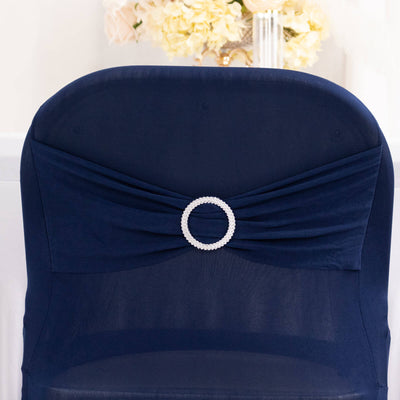 Navy blue chair cover with pearl accent for elegant decor