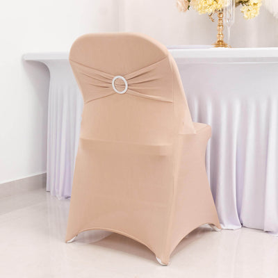Elegant beige chair cover with decorative back detail