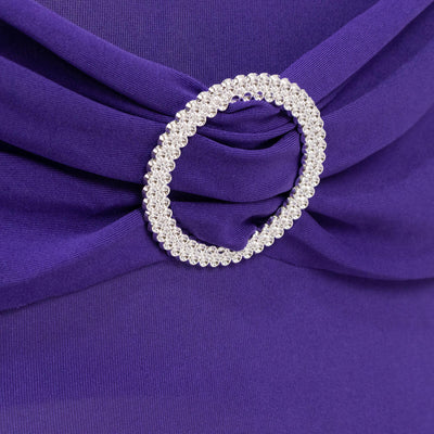 Purple dress with a jeweled brooch detail.