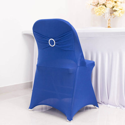 Blue chair cover with a decorative bow detail.