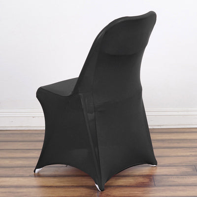 Black chair with a modern design, showcasing its sleek silhouette.