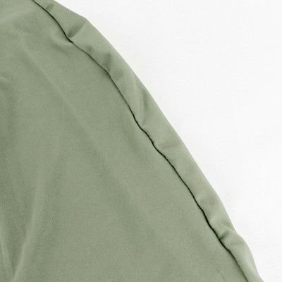 Green fabric with a smooth texture and subtle seam detail.