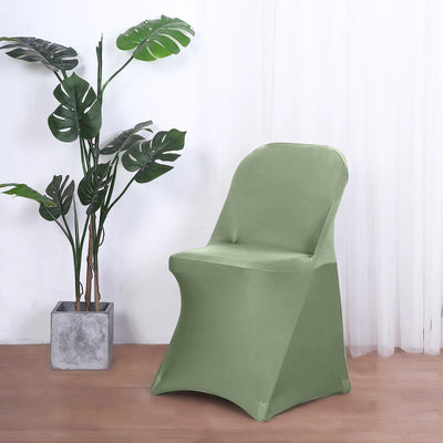 Green chair cover on a modern chair beside a potted plant.