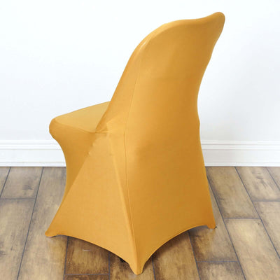 Yellow chair cover on a sleek chair against a plain background.