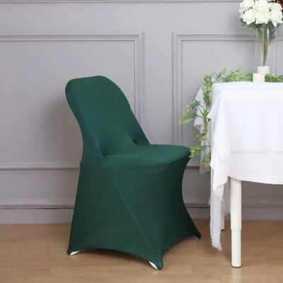 Green chair with a stylish design in a modern dining setting.
