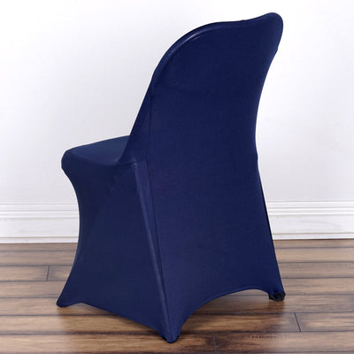 Navy blue chair cover on a modern chair against a plain background