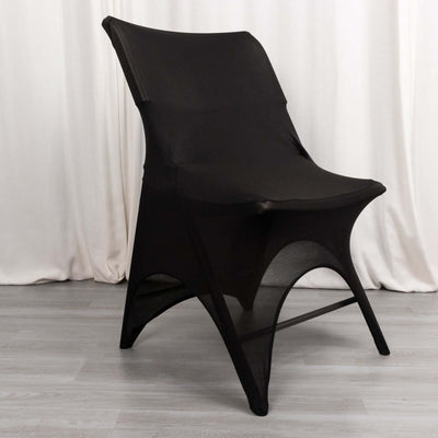 Black contemporary chair on a light backdrop.