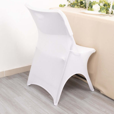 White folding chair on a plain backdrop, ideal for events and gatherings.