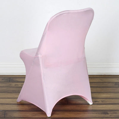 Pink chair with a sleek design, showcasing a modern aesthetic.