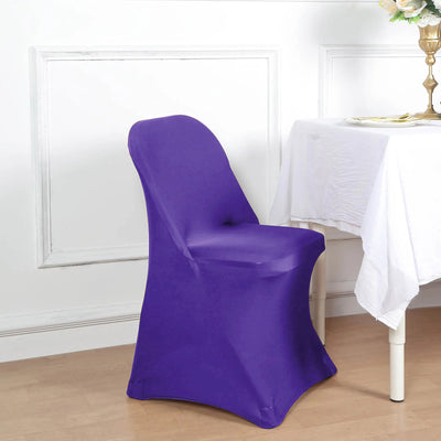 Purple chair cover on a dining chair beside a table.