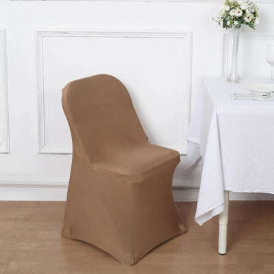 Brown chair cover draped over a chair near a dining table.
