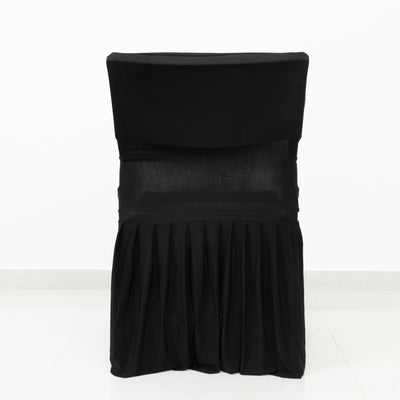 Black chair cover with pleated design, showcasing elegant style.
