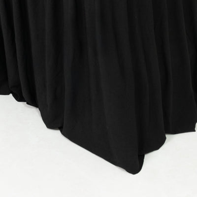 Black draped fabric with soft texture and flowing design.