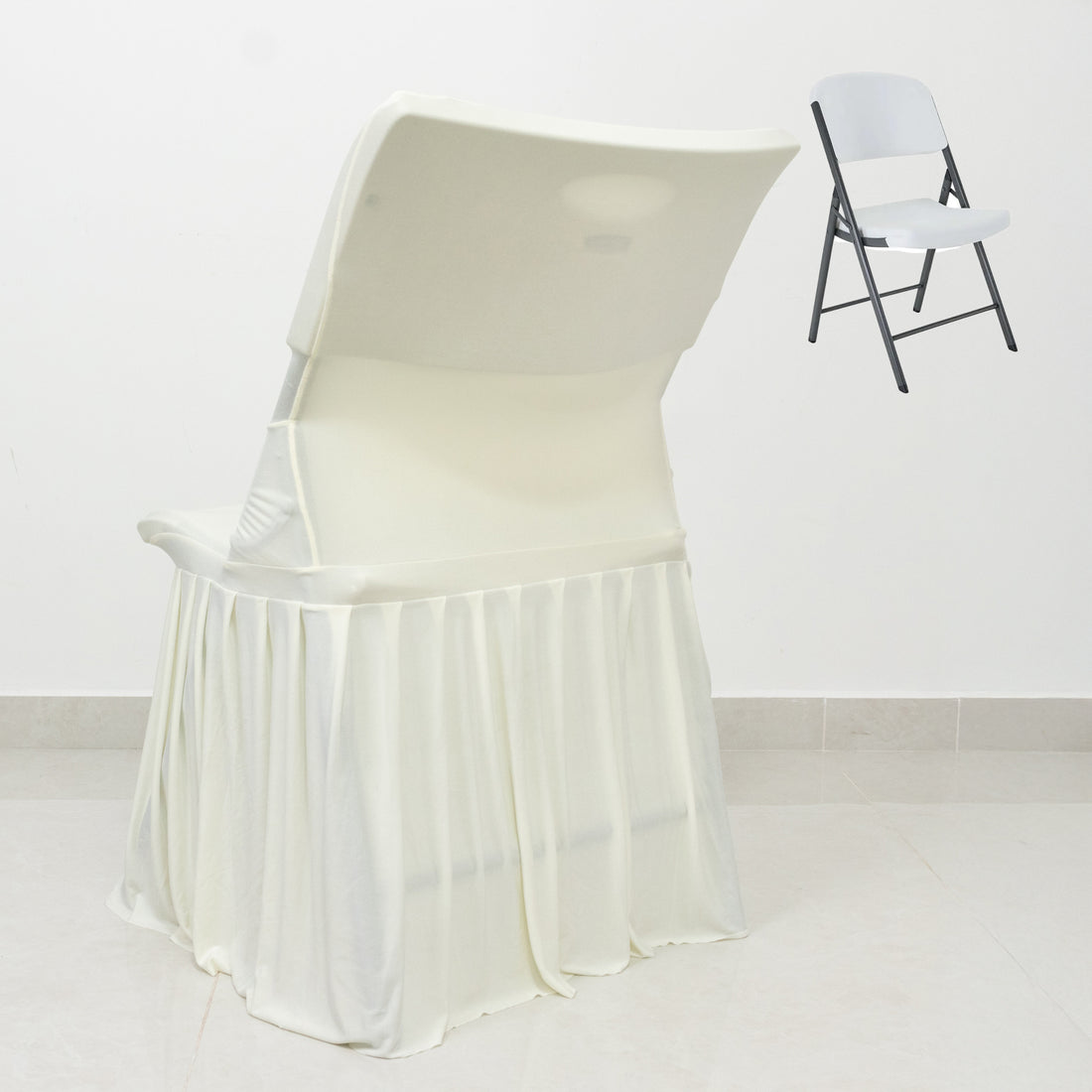 White folding chair with a draped cover