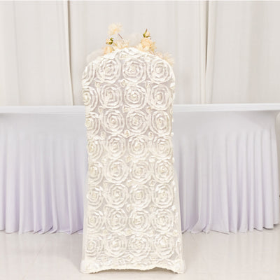 White floral table cover with rose design on a banquet table.