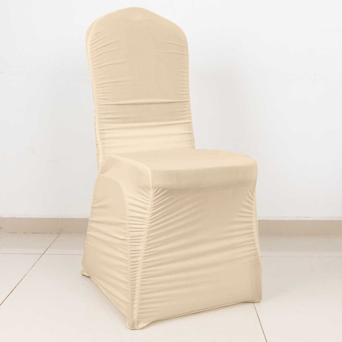 Beige stretch dining chair cover on chair, front view
