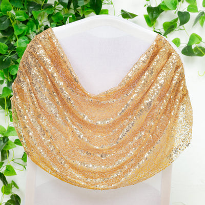 Gold sequin shawl draped elegantly over a chair
