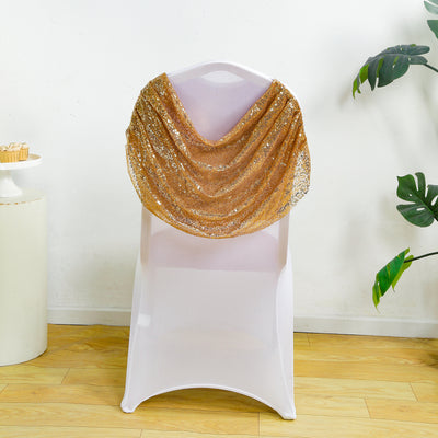 Elegant gold sequin shawl draped over a chair in a stylish setting.