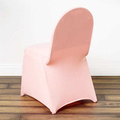 Pink plastic chair with a smooth design, viewed from the back.
