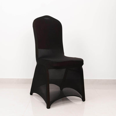 Black mesh dining chair on a plain background