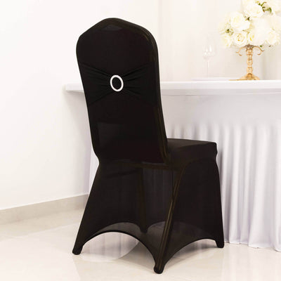 Elegant black chair cover with decorative bow and ring detail