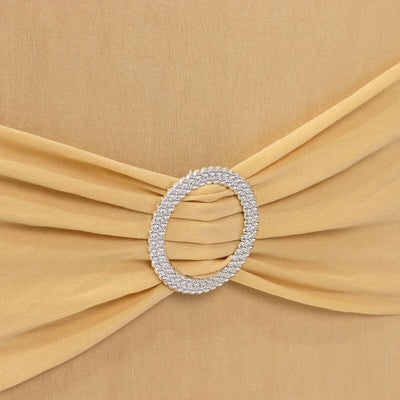 Elegant yellow dress with embellished belt detail.