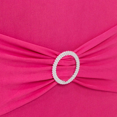 Pink dress detail with a sparkly jeweled belt embellishment.