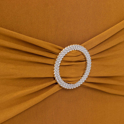 Brown dress with a sparkling circular belt detail.