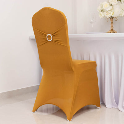 Elegant mustard yellow chair cover with decorative bow detail.