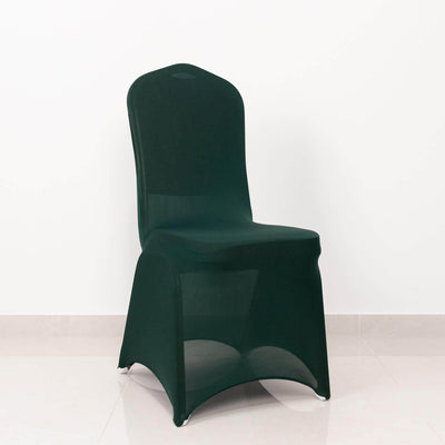 Green chair cover on a plain chair against a white background