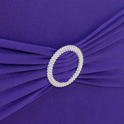 Purple dress with a jeweled belt detail.
