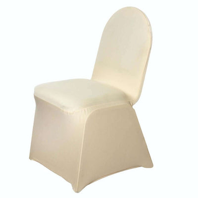 Beige chair with slipcover on a plain white background
