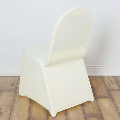 Ivory plastic chair with a curved backrest on a wooden floor.