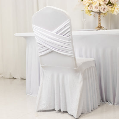 White chair cover with draped back design, perfect for elegant events.