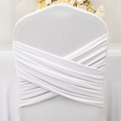 White chair cover with elegant draping detail.