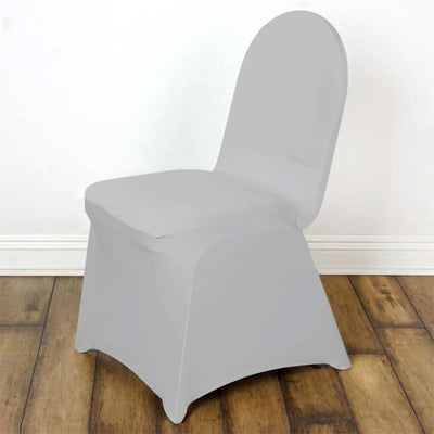 Gray chair cover on wooden floor backdrop.
