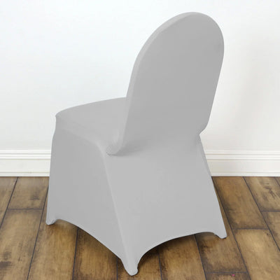 Gray chair cover on a chair against a plain background.
