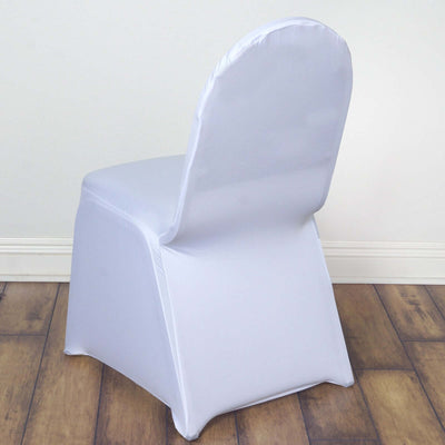 White chair cover on a plain chair against a light-colored floor.