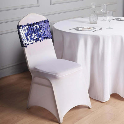 Elegant white chair with sequin backrest at a dining table setting.