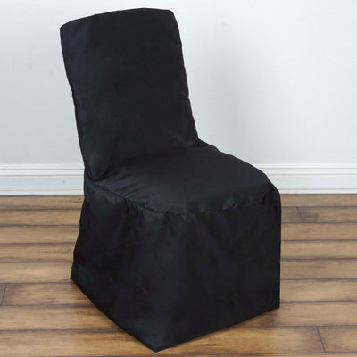 Black upholstered chair on wood floor with a sleek design.