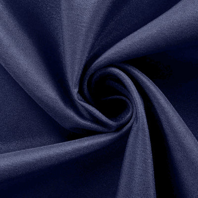 Navy blue fabric texture in a swirling pattern.