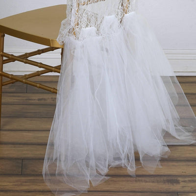 White tulle skirt draping elegantly over a gold chair.