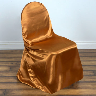 Satin gold chair cover draped on a chair