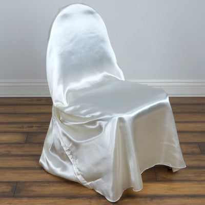 Elegant satin chair cover draped over a chair, showcasing its smooth texture.