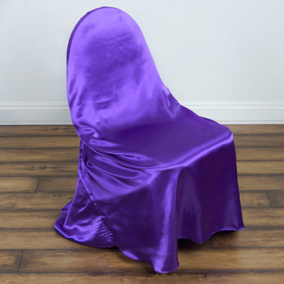 Purple satin chair cover on a wooden floor.