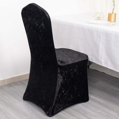 Black stretch chair cover for elegant dining setups.