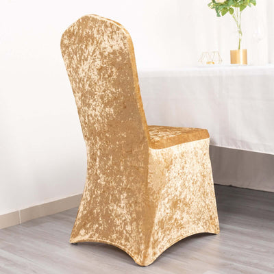 Gold velvet dining chair with a sleek design and elegant finish.