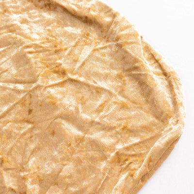 Gold velvet fabric with a soft, textured surface.