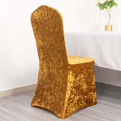 Gold velvet dining chair cover, elegant and stylish for events.