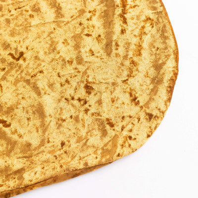 Textured golden fabric with a soft sheen.
